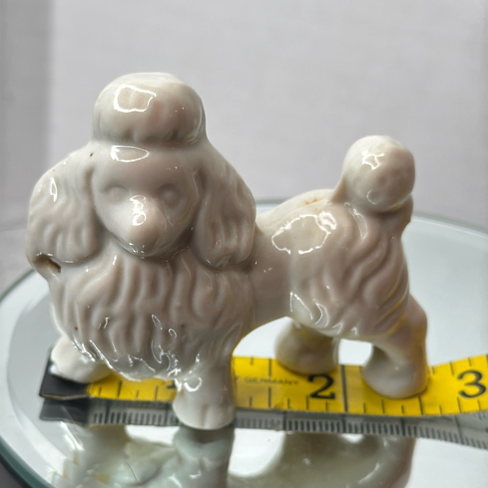 Poodle Dog Figurine Japan pressed in whole for chain 2.5”
